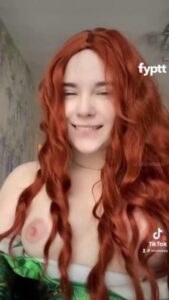 THIS GIRL COSPLAYING A SEXY TOPLESS TIKTOK REDHEAD