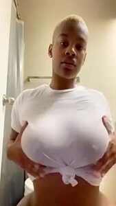 Baldhead Ebony Playing With Herself In The Bathroom